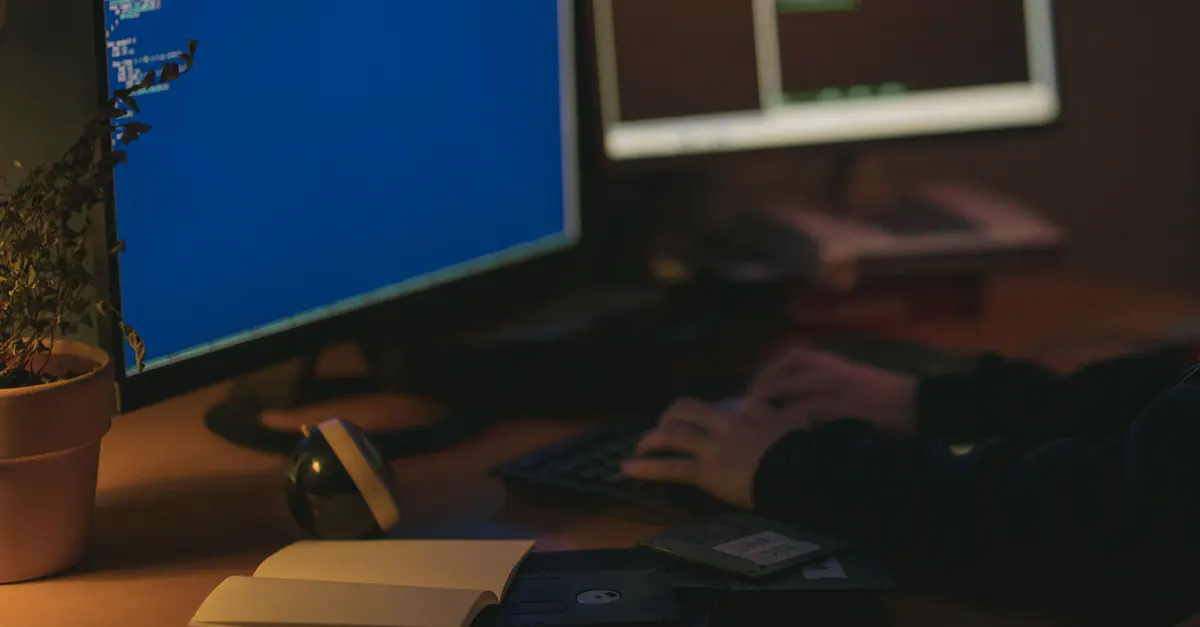 A developer's dual-monitor workspace at night, standing in for scoping a Revit plugin development cost