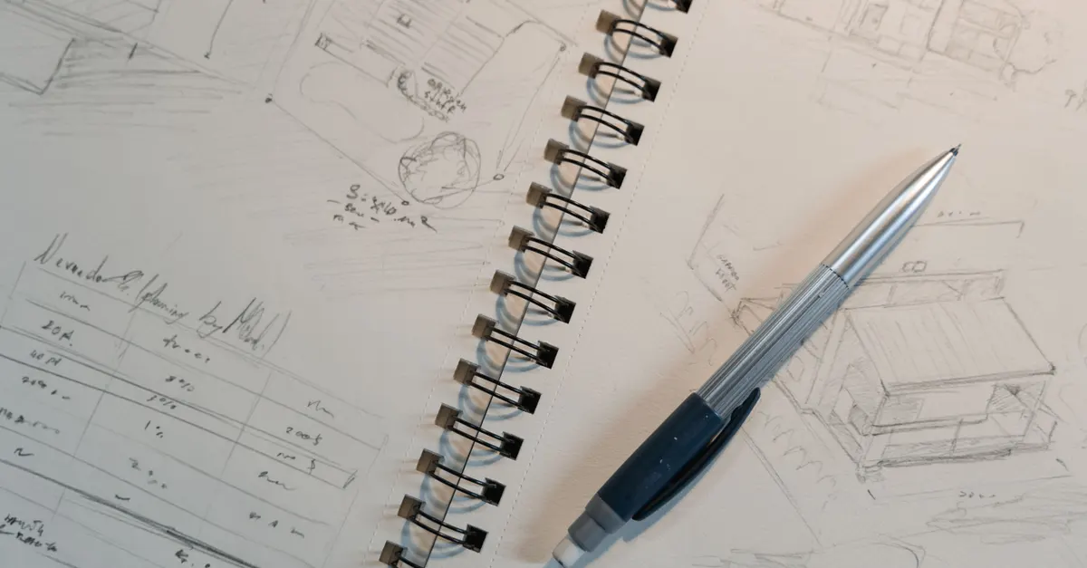 A sketchbook with hand-drawn design notes and a pen, standing in for documenting a process before requesting a plugin quote
